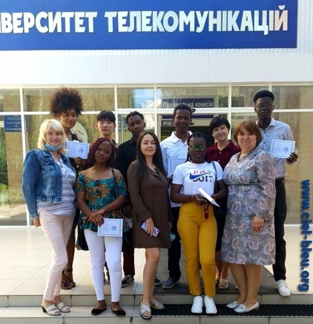 International students in front of the State University of Telecommunications in Kyiv